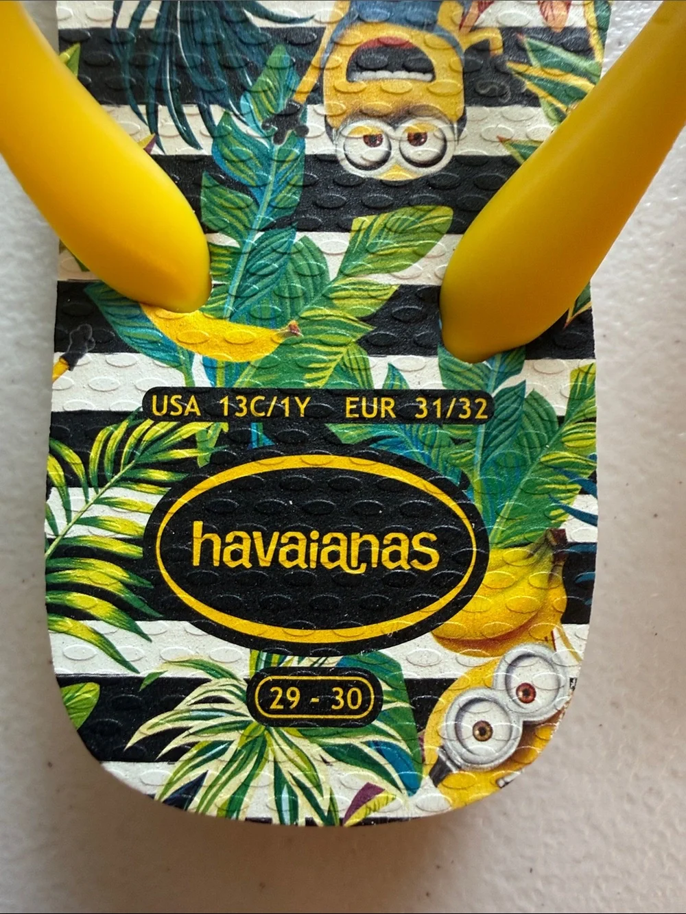 Havaianas Kids Yellow Minions Tropical Flip Flops - Green Leaf Print